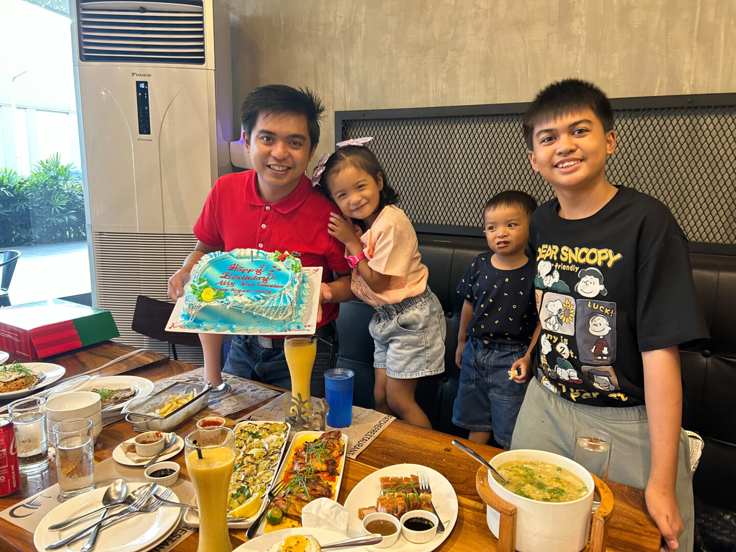 an image of a guy with cake and foods